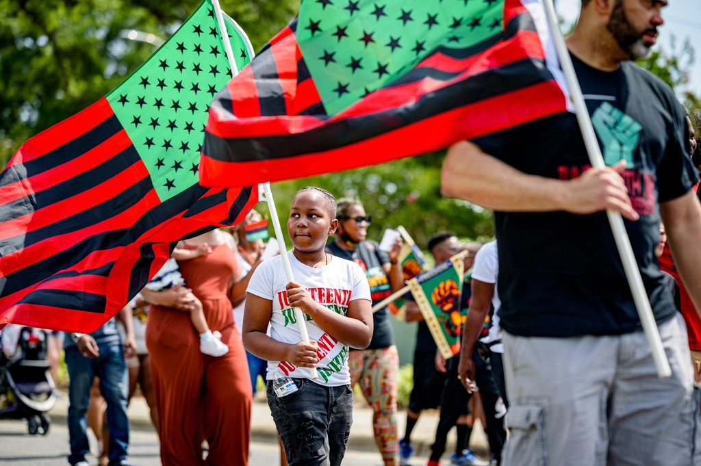 Juneteenth celebration march Uptown Greenville